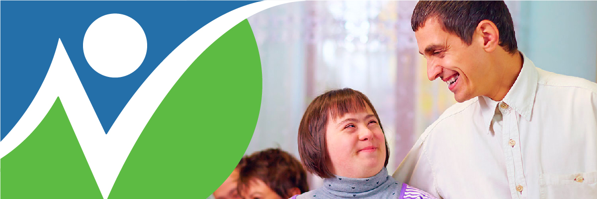 NNCIL logo next to photo of a male teacher with a young woman with a cognitive disability