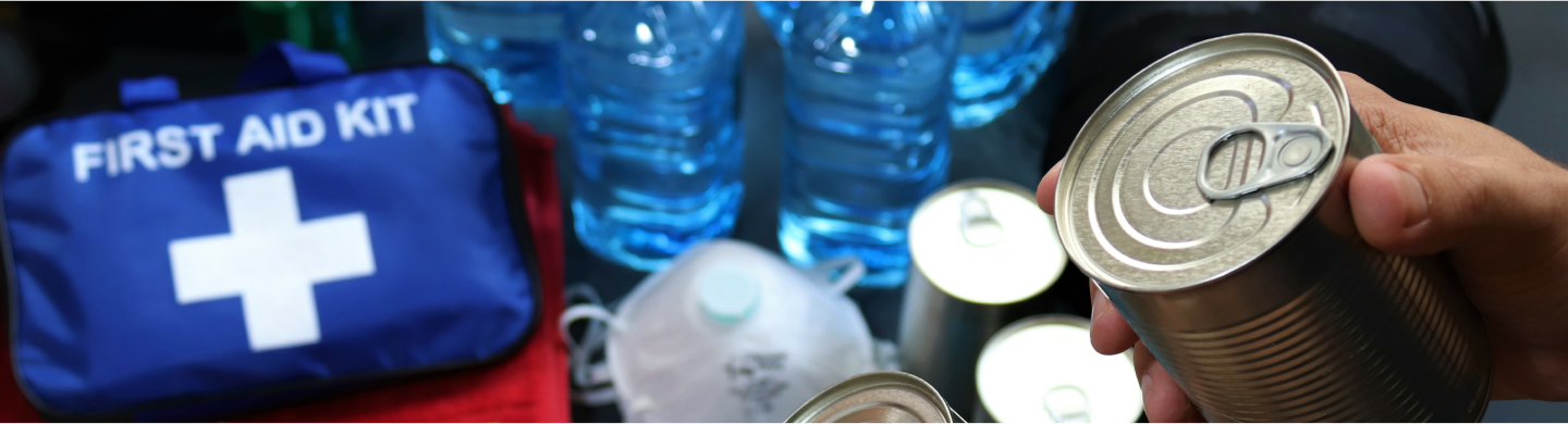 Items you might need when sheltering in place during a pandemic, like a first aid kit, water, masks, canned food